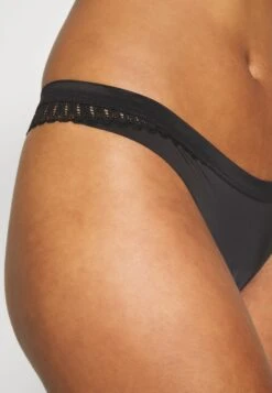 Triumph Aura Spotlighthigh Leg - String - Black -Mode Lingerie Winkel 608195ad2ea54c3c869b021563047129